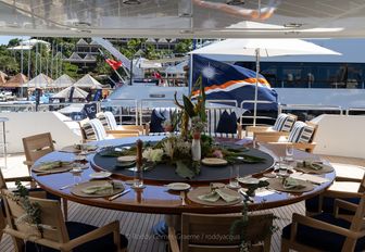 A decorated tablescape onboard a luxury yacht charter