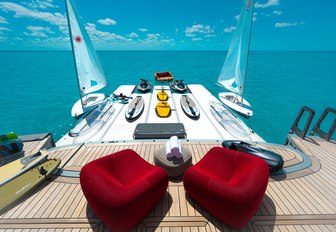 Charter yacht BOLD water toys on standby with red seats