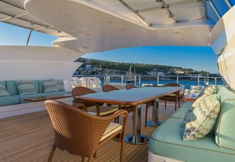 al fresco dining table on the sundeck of superyacht Africa I