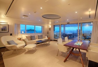 beach house style interior of main salon aboard expedition yacht SENSES