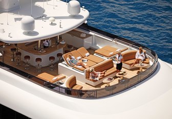 sun pads, seating and bar on the sundeck of motor yacht Martha Ann