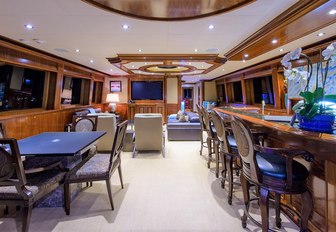 bar and games table in the elegant skylounge aboard luxury yacht EXCELLENCE