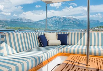 chic outdoor seating area on the sundeck of motor yacht Cheetah Moon