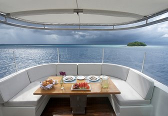 casual open-air dining area suitable for breakfast on board luxury yacht SENSES 