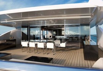 The alfresco dining section included on the exterior of motor yacht Seven Sins