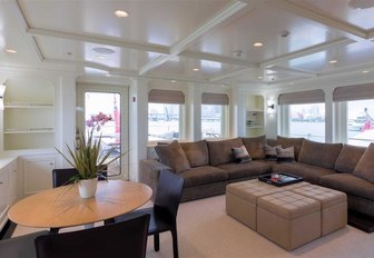 light and airy upper salon aboard charter yacht SAFIRA with large, L-shaped sofa