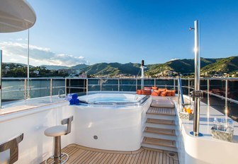 raised Jacuzzi and bar on the sundeck of luxury yacht DIANE