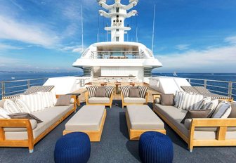 large open-air lounge on the sundeck of charter yacht TV