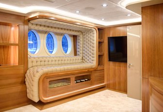 Comfy seating built into wall on superyacht ARESTEAS