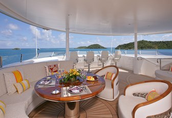 seating area set for a lunch on the forward part of the sundeck on board luxury yacht AMARYLLIS 