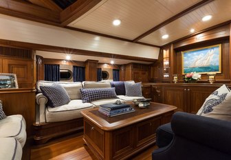 seating area in the main salon of charter yacht MARAE