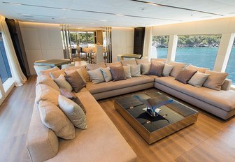 sumptous skylounge with U-shaped sofa aboard luxury yacht OURANOS