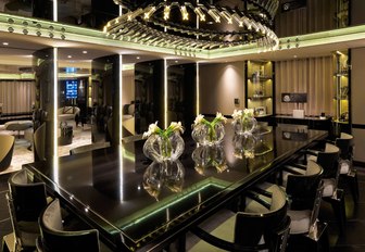 formal dining area in the art deco-themed main salon of luxury yacht SEALYON