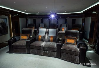 cinema lounge on charter yacht excellence v, with sumptuous chairs