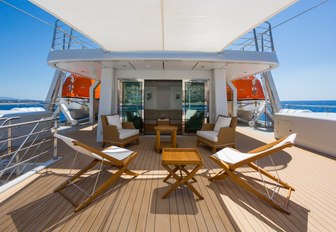 seating area on deck of superyacht yersin