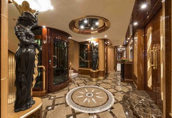 Lift and reception area adorned with status on board superyacht Mine Games