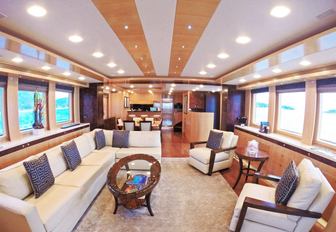 maple and burl walnut main salon aboard charter yacht ‘Mystic Tide’ 