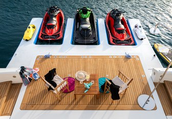 toys lined up on swim platform of charter yacht africa i 