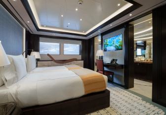 Superyacht charter WHISPER guest cabin with central berth