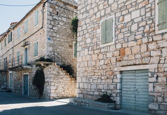 Old buildings in the quaint fishing village, Stomorska, Solta, Croatia