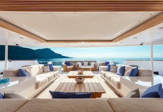 the upper aft deck of charter yacht o'mega on a beautiful and clear day