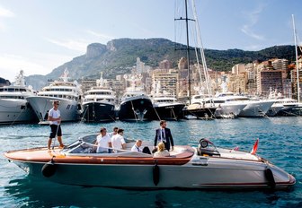 VIP clients being tendered on board a Riva in Port Hercules