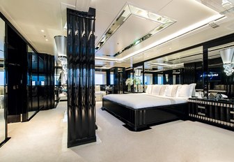 Art Deco-themed master suite with black lacquered surfaces aboard motor yacht Silver Angel 