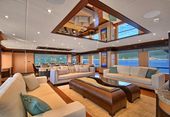 large sofas in the main salon of luxury yacht MEIRA