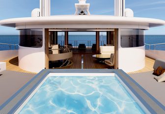 large pool and under cover seating on the sundeck of superyacht Illusion Plus 