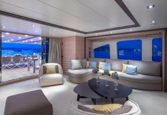 seating area and door opening onto deck in the skylounge on board luxury yacht DYNAR