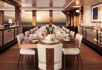 formal dining area set up for dinner on board charter yacht Lady E 