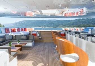 bar, seating and Jacuzzi on sundeck of luxury yacht CHASSEUR 