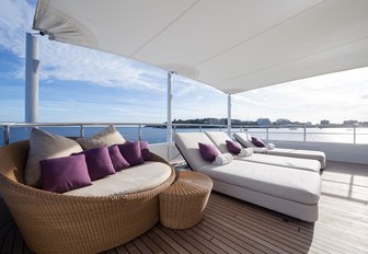 lounging option under retractable bimini aboard motor yacht GO