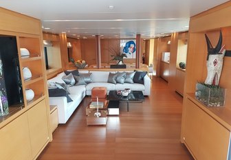 L-shaped sofa in the main salon aboard superyacht AWOL