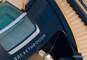 Charter yacht BREAKTHROUGH aerial view of nameplate and swimming pool