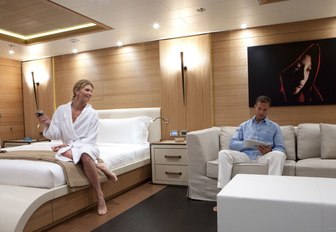 guests relax in the tranquil master suite aboard charter yacht SPIRIT