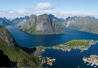 small settlement build on the dramatic coast of the Norwegian Fjords