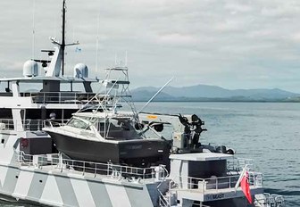 Sports fishing vessel on dock of The Beast Explorer yacht 