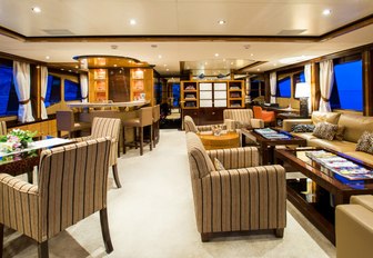 skylounge aboard motor yacht DIANE with ample seating, games table and bar