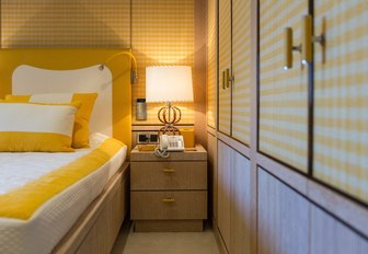 Warmly light bedside light in room on Superyacht AXIOMA