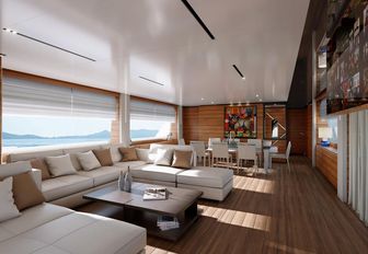 the main salon of charter yacht penelope with earthy tones and cream furnishings