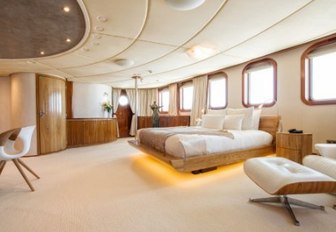 master suite with large bed on board superyacht SHERAKHAN