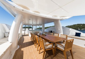 alfresco dining table on the sundeck of motor yacht LILI