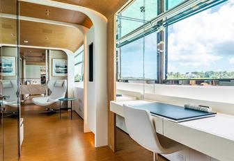 Charter yacht KOJU master cabin study with desk and window