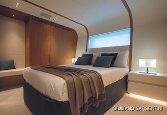 Charter yacht LEGEND guest cabin with central double berth