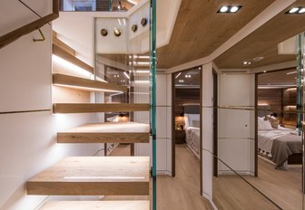 stylish staircase on board a luxury superyacht rental