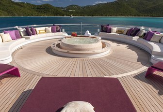 sundeck Jacuzzi surrounded by seating aboard luxury yacht SOLANDGE 