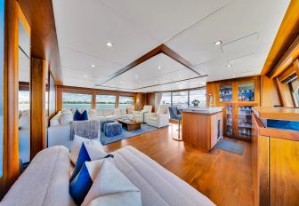 Charter yacht NATURAL 9 upper salon lounge with white seating