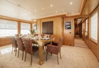 formal dining area in the main salon of charter yacht OASIS