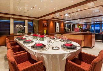 formal dining area in the main salon of charter yacht Sequel P